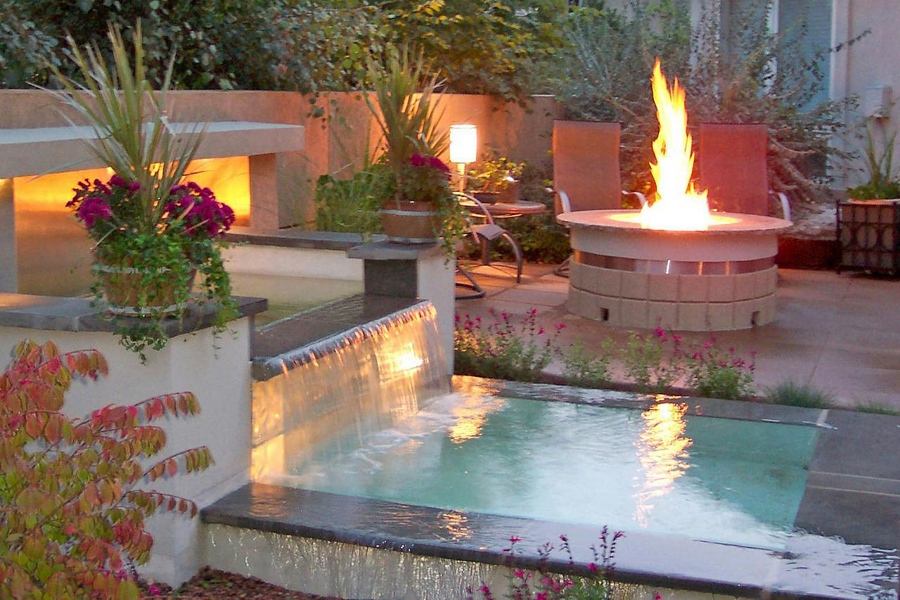 Modern-Backyard-Water-Feature-Dipping-Pool-Fireplace-Seating