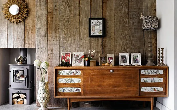 Reclaimed rustic timber wall in the living room featured on The Telegraph