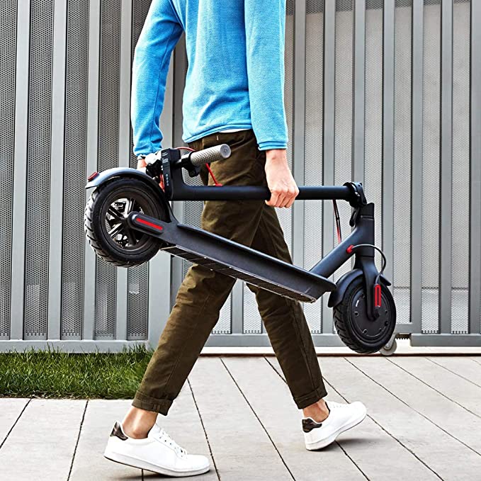 Xiaomi Mi M365 Electric Scooter Folded and Carried Xiaomi Mi M365 Electric Scooter Folded and Carried