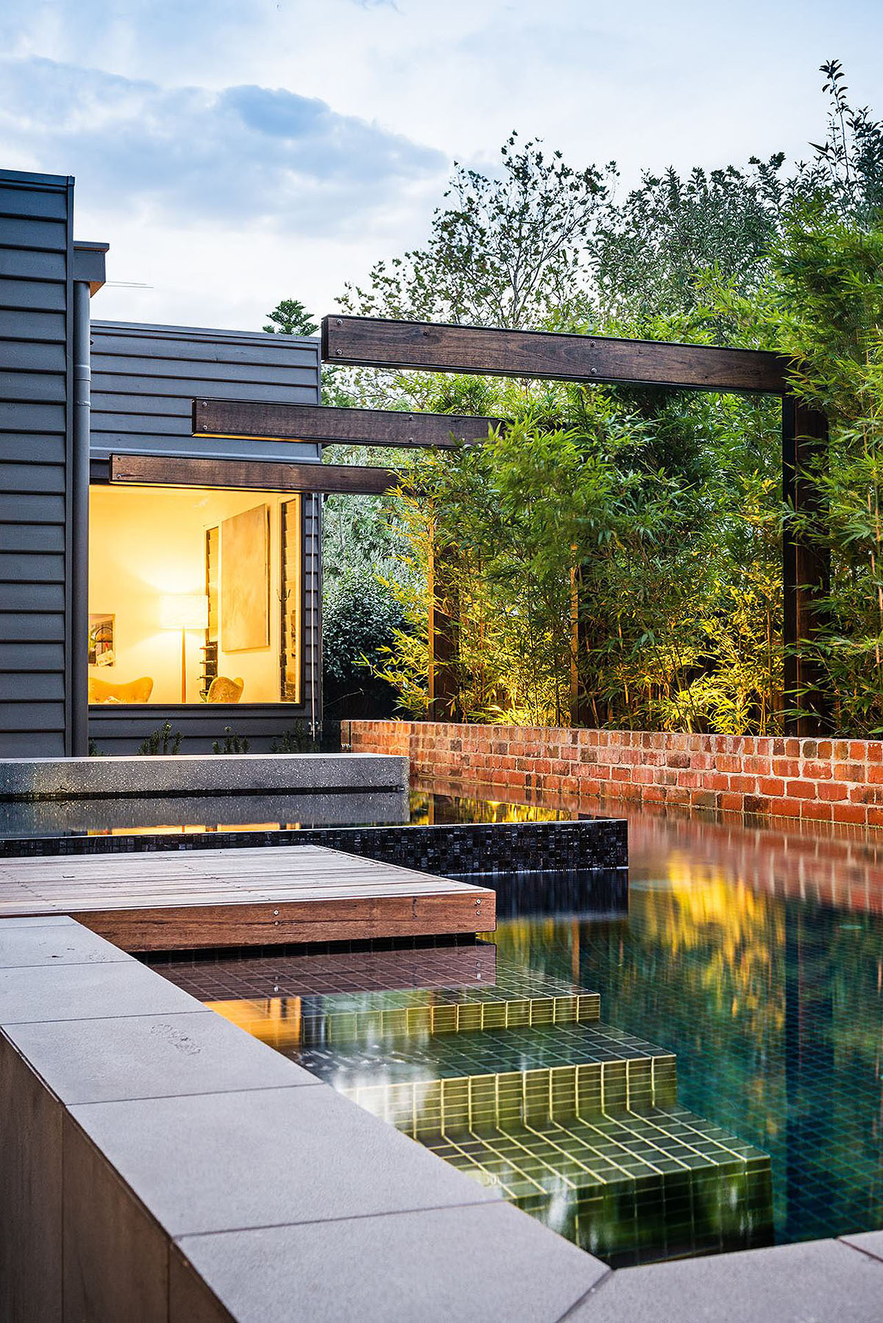 Modern-Backyard-Stunning-Design-swimming-pool-wooden-deck-bamboo-trees