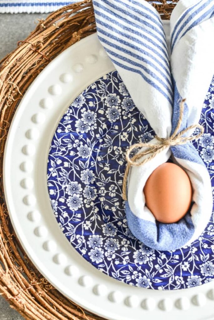 Bunny Napkin fold wrapped around egg 
