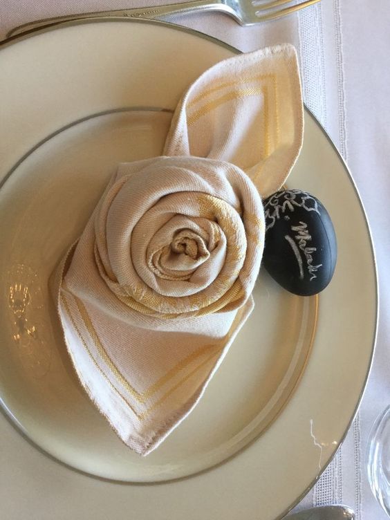 Gorgeous cream silk napkin folded as a rose