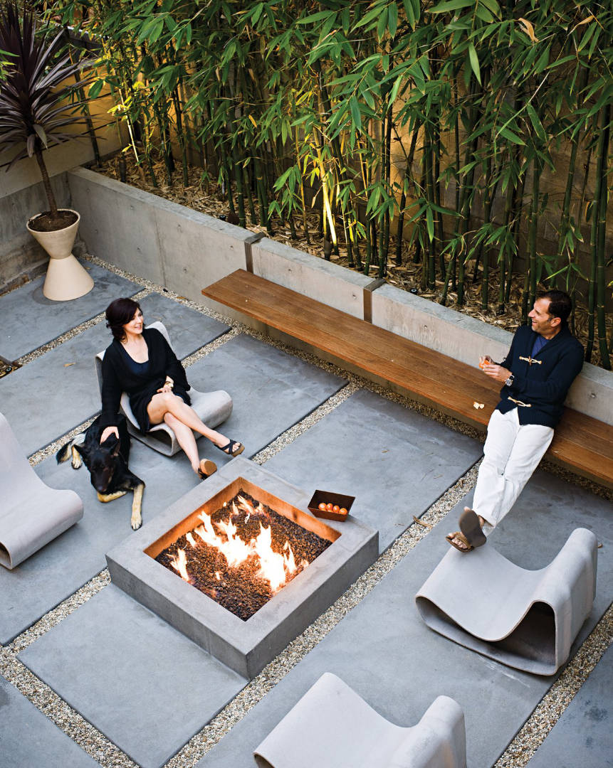 Backyard fireplace area with a long hardscape dwell