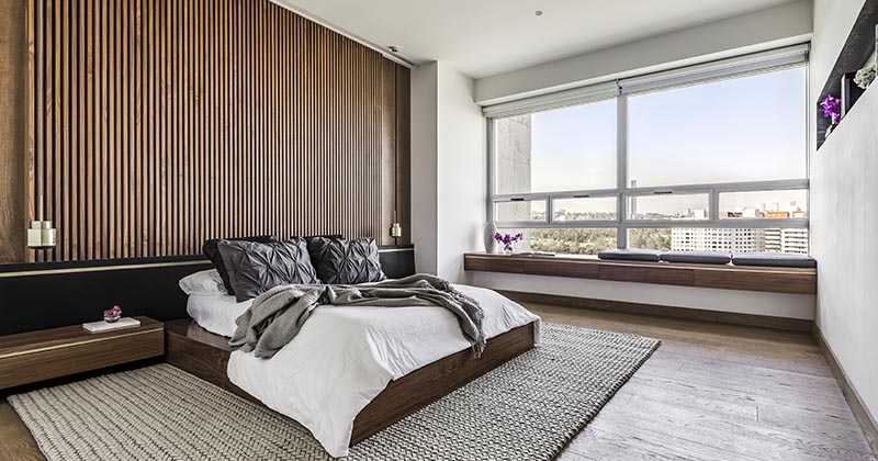 Modern bedroom wood accent wall window by contemporist