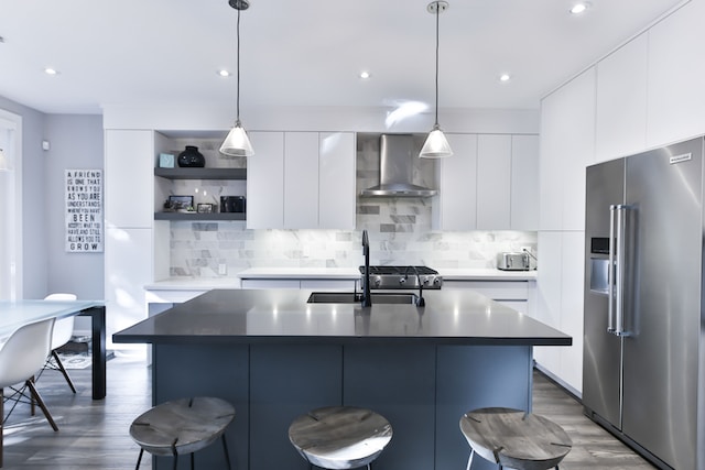 modern kitchen with stainless steel cooker hood