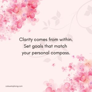 Background: Light pink background with watercolour cherry blossoms at top left and bottom right of square box. Text: Clarity comes from within. Set. goals that match your personal compass.