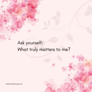 Background: Light pink background with watercolour cherry blossoms at top left and bottom right of square box. Text: Ask yourself: what truly matters to me?