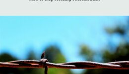 Text: Overcoming Barriers to Self Love How to Stop Holding Yourself Back. Colourmyliving.com Image of barbed wire against a blurry background of blue sky and trees.